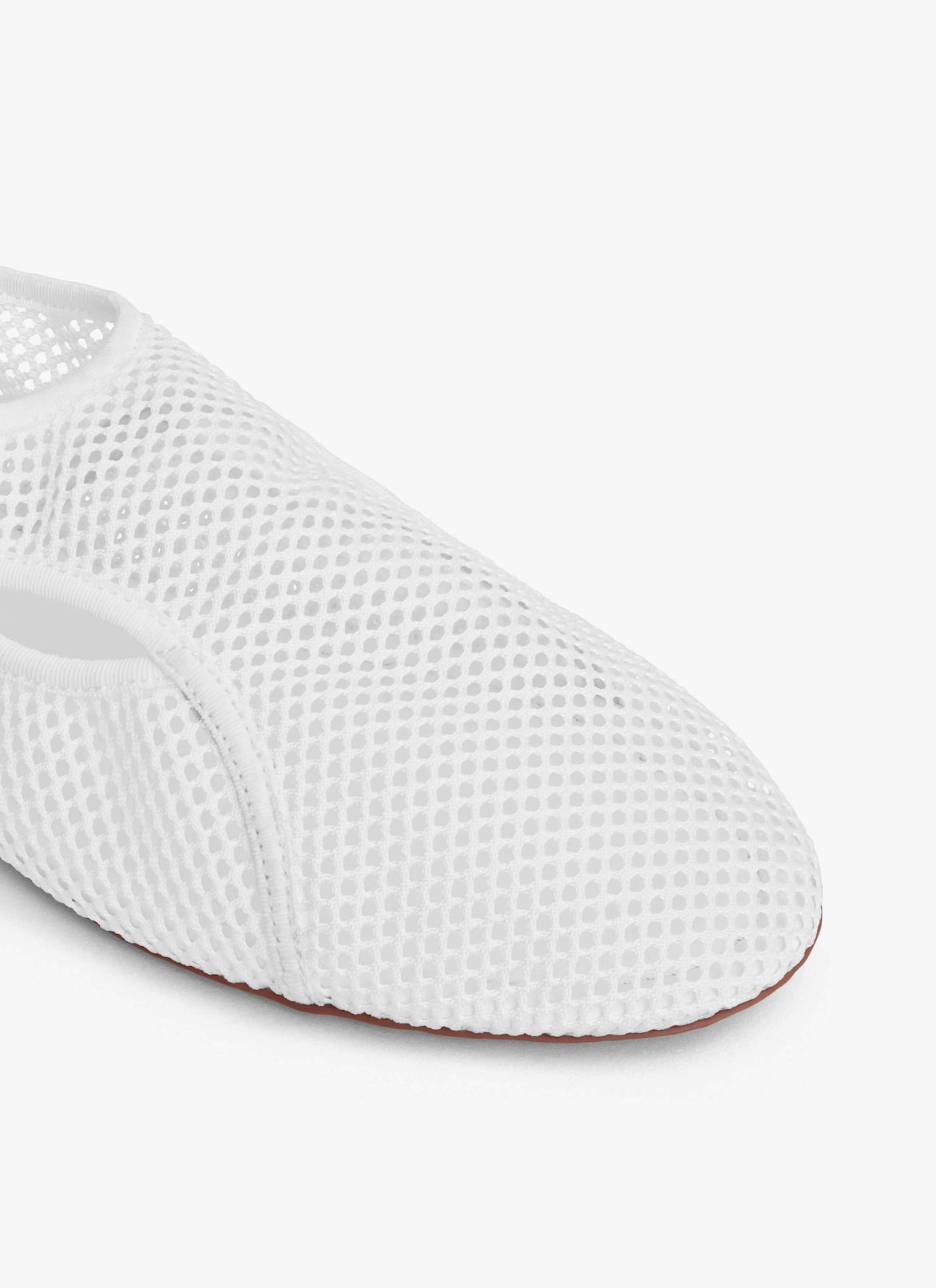 SLIPPERS IN FISHNET ALAÏA OPTIC WHITE SLIPPERS IN FISHNET